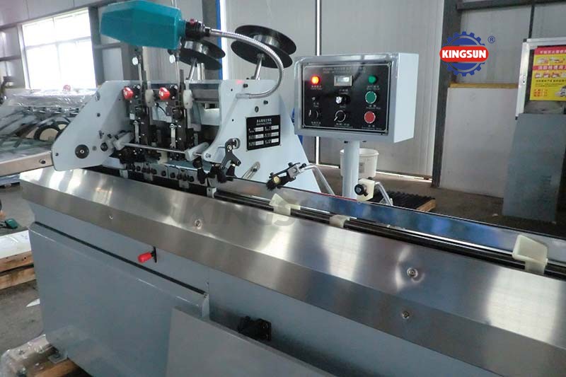 Semi-automatic saddle stitching machine